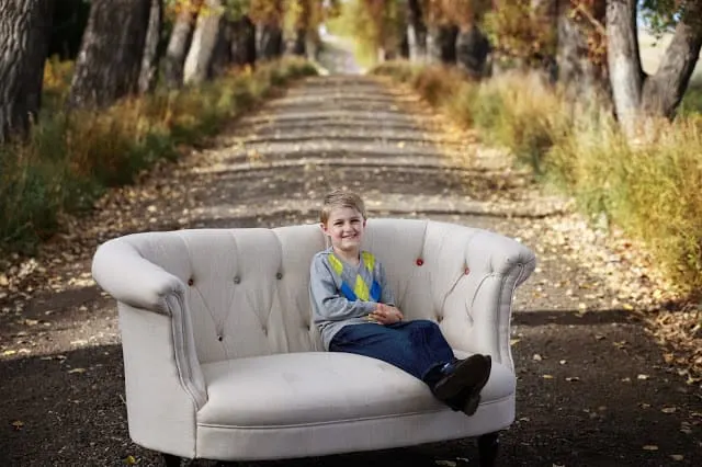Yellow and blue family photos, fall family photos, family photo poses with couch, casual family photos, Krista Haffner Photography