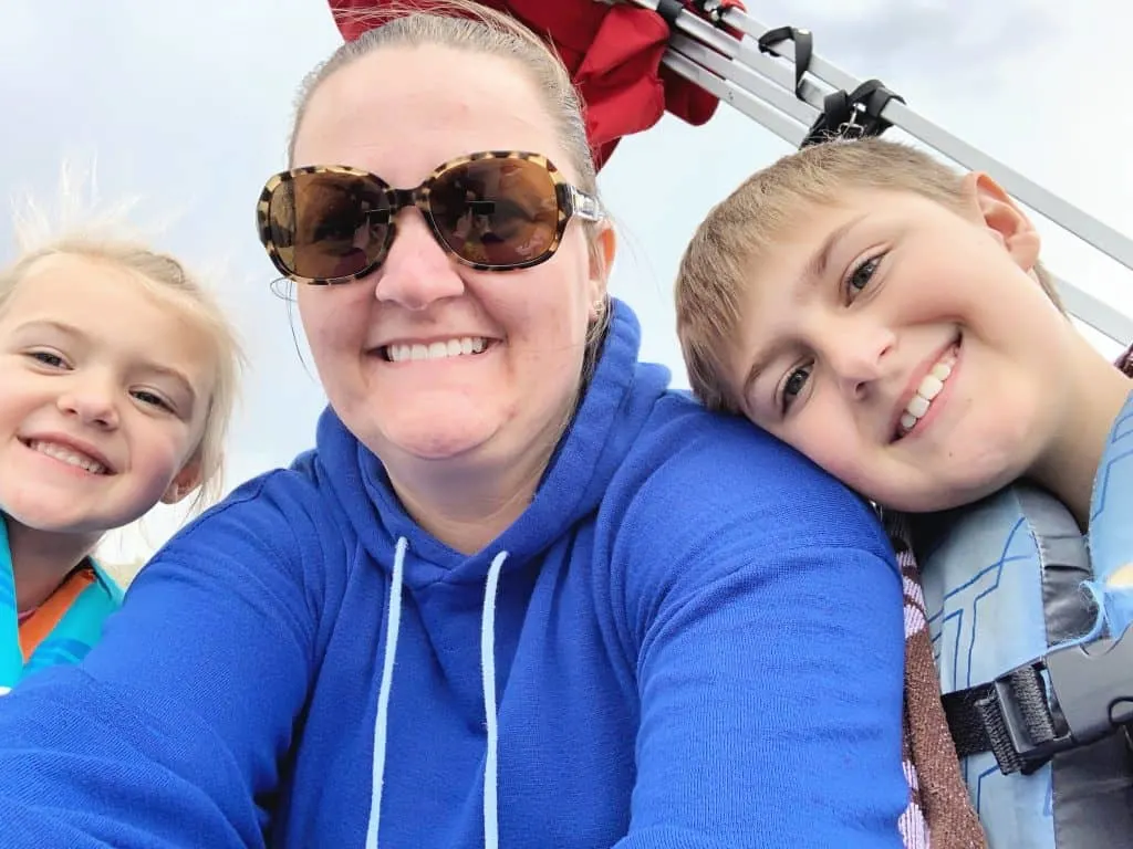 Mom and Kids on boat selfie