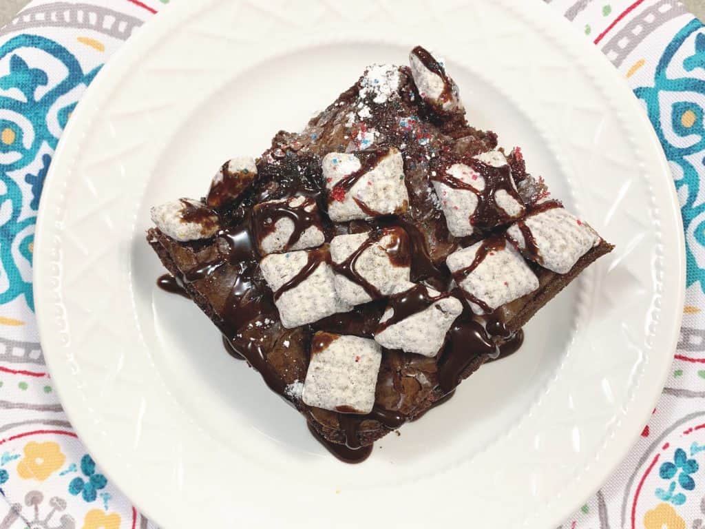 Puppy Chow Brownies with sprinkles