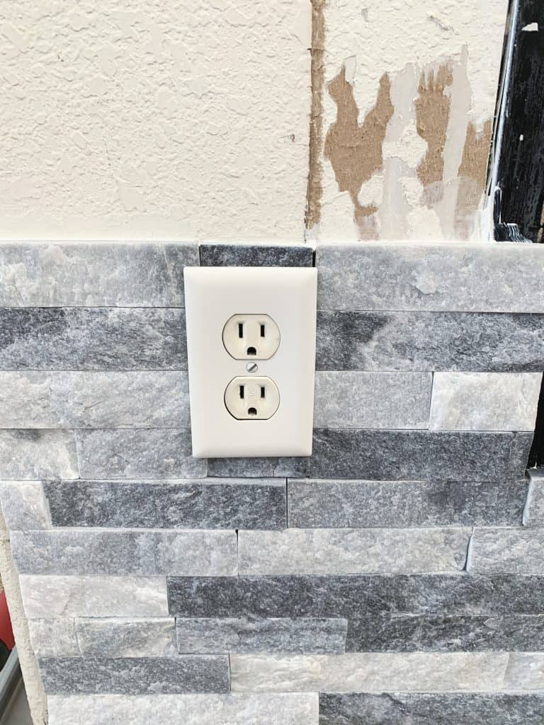 Placing tile around an electrical outlet