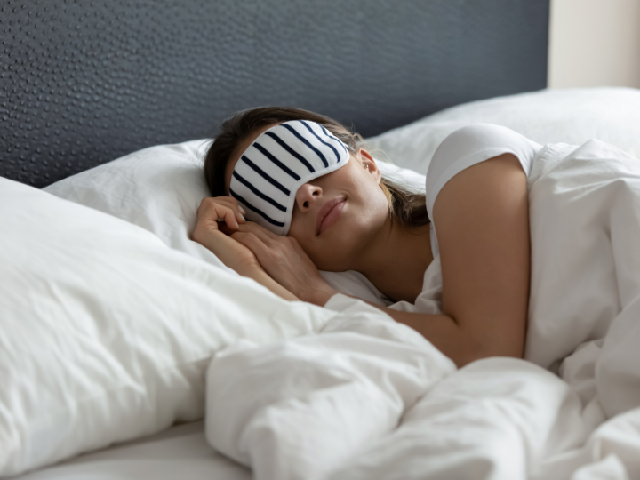 woman sleeping with mask