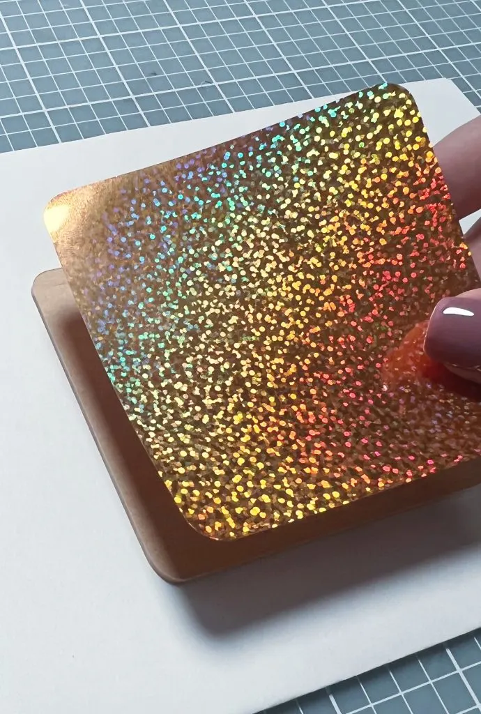 Placing holographic vinyl on basswood
